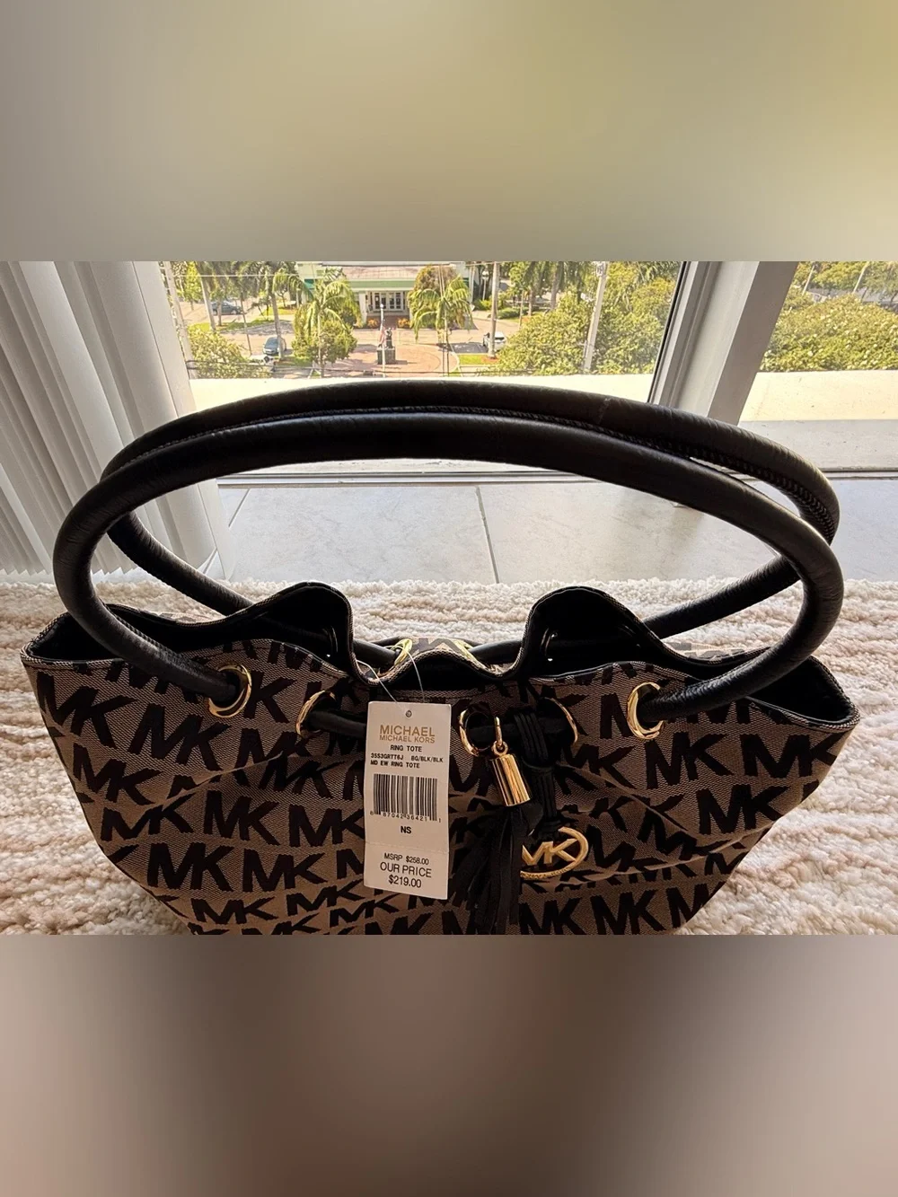 Michael Kors Brown and Black MK Signature Tote with Tassel Charm